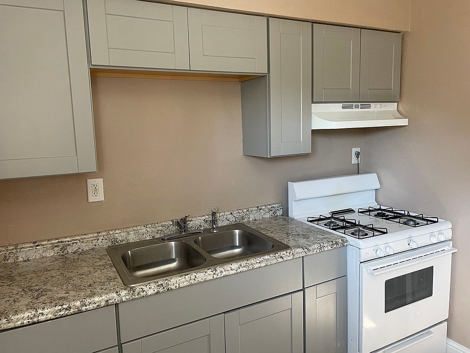 Kitchen area with regular size stove/oven.