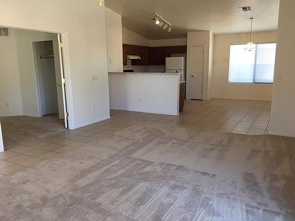 From Living Room Into Kitchen and Dining Nook; Den/4th Bedroom on the Left