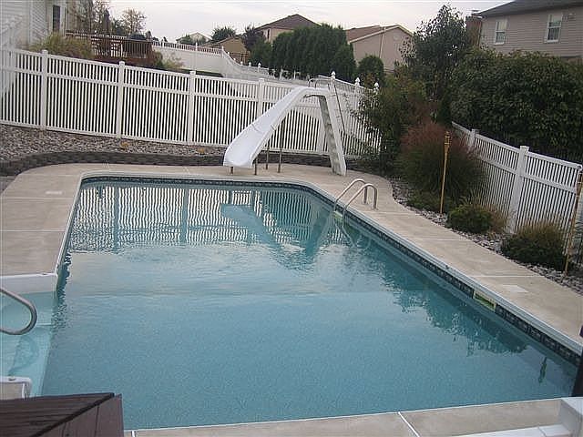 inground pool with slide
