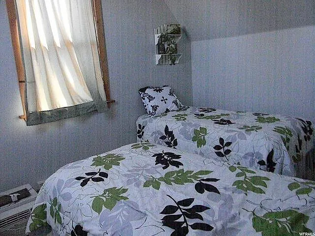 Apartment has two rooms that can be used as two bedrooms or one bedroom and one living room - 12 W 200 N
