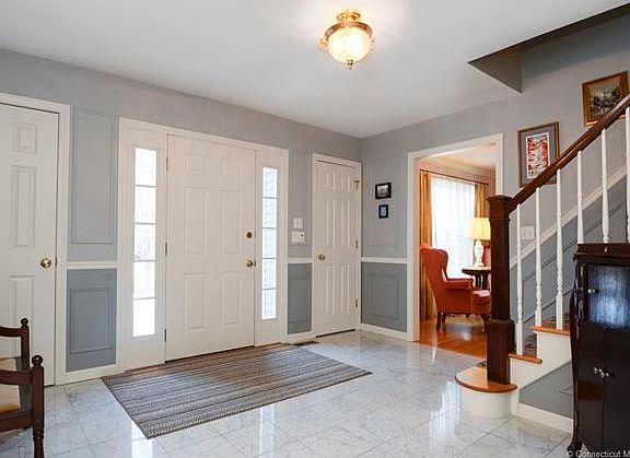 Two coat closets, wainscoti...