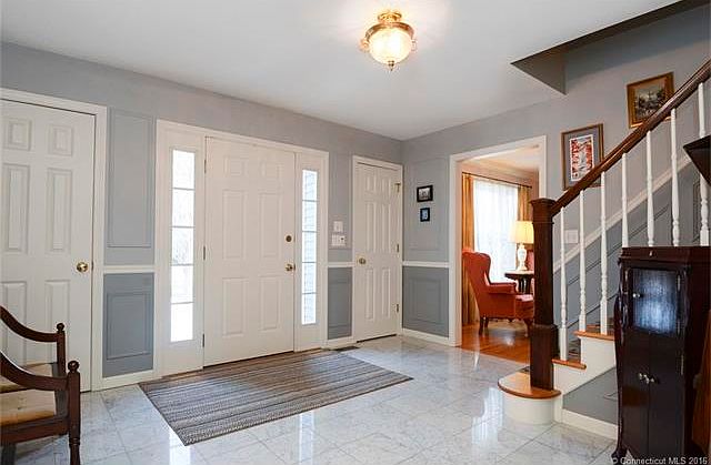 Two coat closets, wainscoti...