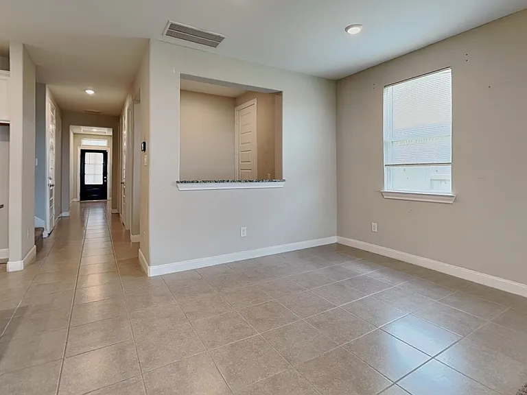 Spacious hallway with neutral
