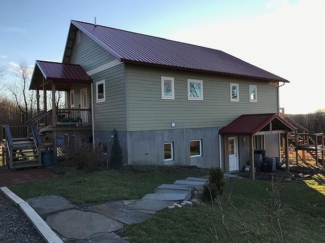 The house is a duplex with another apartment on the bottom floor