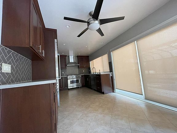 Kitchen with shades on