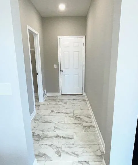 Garage entry with mudroom closet.