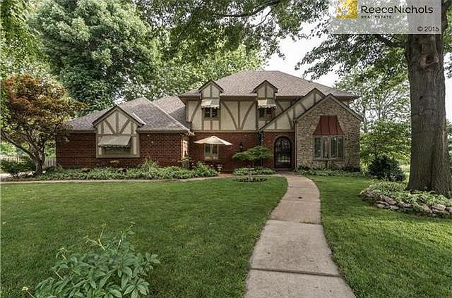 Stunning, timeless Two Story nestled at the end of a cup-de-sac and right on the golf course!