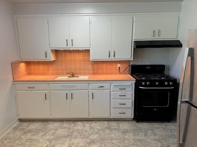The kitchen is big enough for a table that seats six.