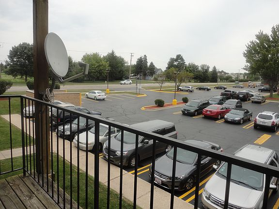 Balcony overlooking parking lot