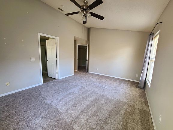 Master bedroom with new carpeting and spacious walk-in closet