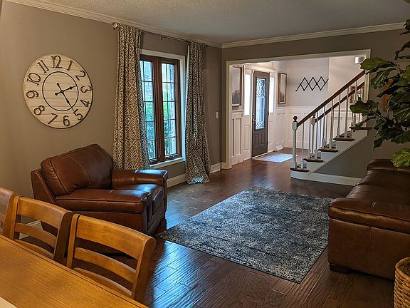 Living room w/ large windows