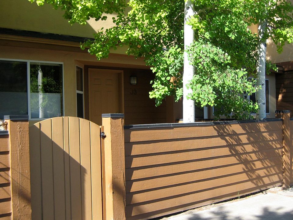 Resident can park outside directly in front of the unit, or in the spacious one car garage located behind the unit. Patio area in the entry.