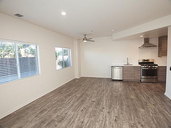 New vinyl wood flooring in kitchen and living room
