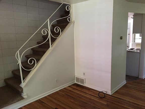 living room stairs to 2nd story bedrooms