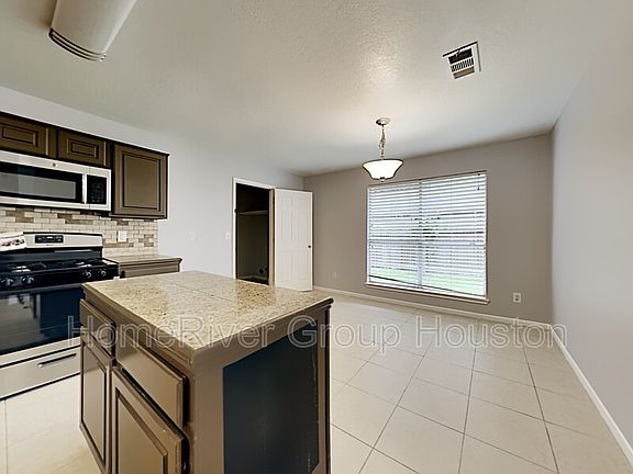 5th image of 6823 Woodland Oaks Dr