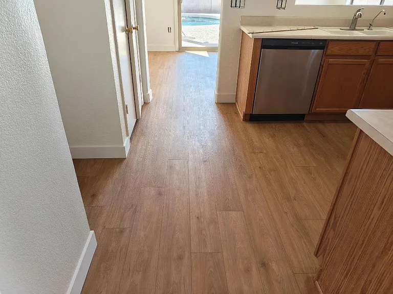 All appliances included w/black & stainless accents to pop off the clean creamy soft but not blinding white walls. Pantry in Kitchen & the sliding glass door now has Sun Zero Theater Grade Curtains - Kitchen sink is being updated 6/8/26