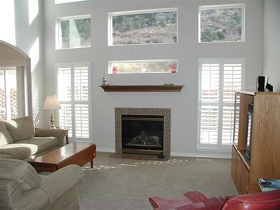 Great room with fireplace & vaulting ceilings