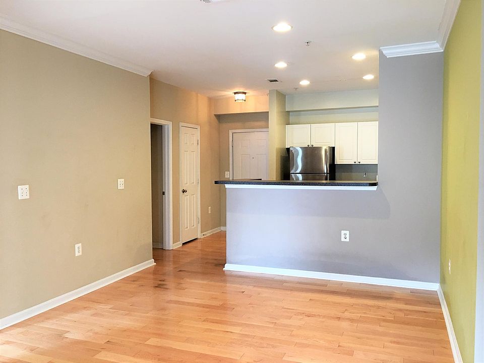 open floor plan with hardwood floor, top level