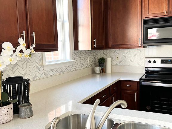 Kitchen with Quartz countertops and all new appliances