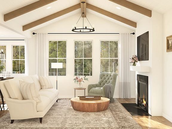Great room with vaulted ceiling and stained beams