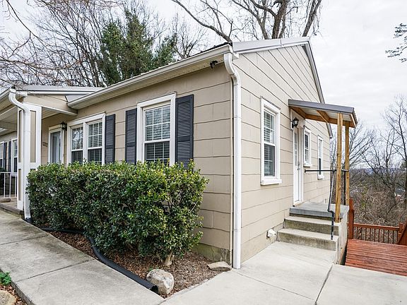 Exterior showing side entrance with keypad entry and decks