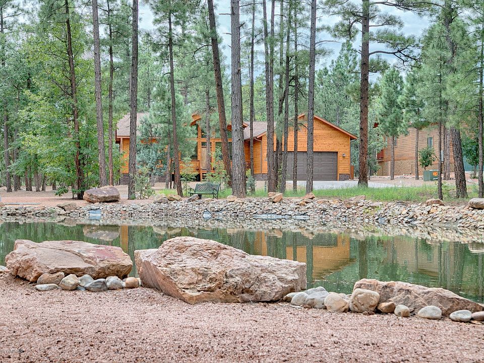 Front Of Home with Pond