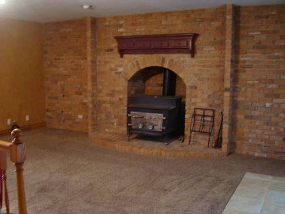 Family room with wood bur