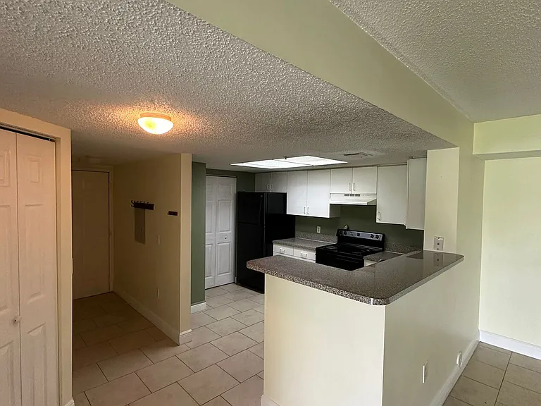 5005 Wiles Rd — Photo 36