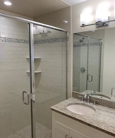 master bath with glassed shower
