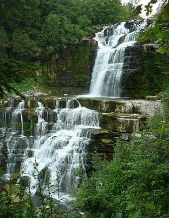 Waterfalls in front yard is same height as Niagara.