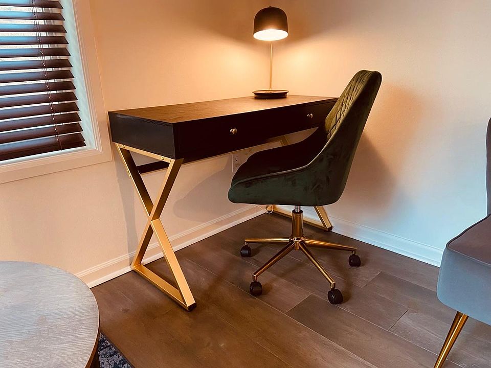 Large, comfortable desk with view to outside.