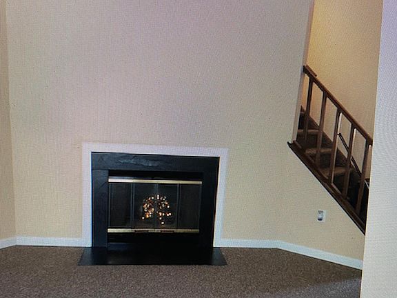 LR W/FP , stairway to bedrooms