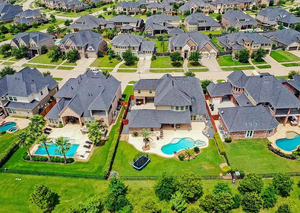This is an aerial shot of the property.  Look for the trampoline.  This home has so much to offer both inside and out!