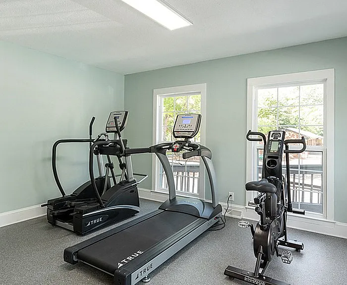 Stay fit and energized in this bright and welcoming home gym.