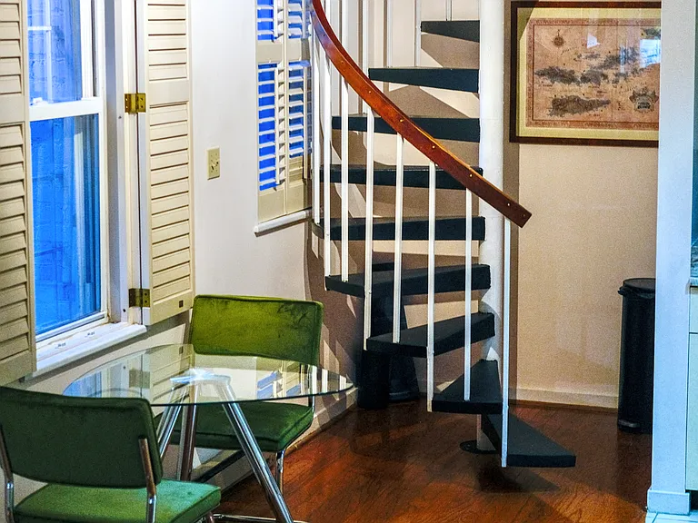 Dining table and spiral staircase