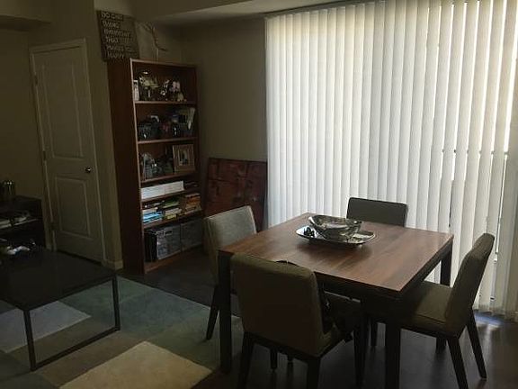 Dining area between living space and kitchen