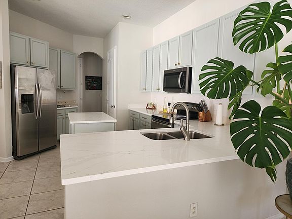 Newly renovated kitchen with stainless steel appliances.