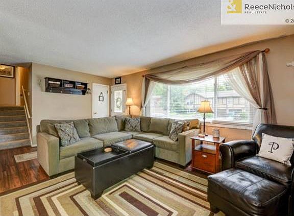Obviously nice space here with couch, love seat, chair and ottom