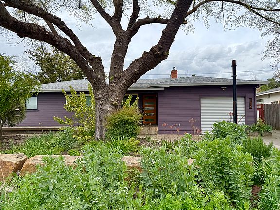 front yard, deck, two driveways, garage with storage space, quiet neighborhood with mostly young families and retirees