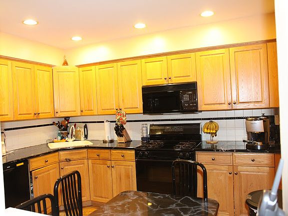 Granite countertops, new appliances, recess lighting, oak cabinets