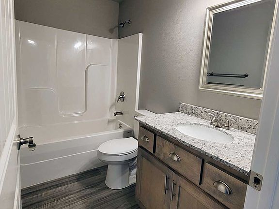 Bath

Photos are not of the specific unit, but represent the materials used and layout of the building.