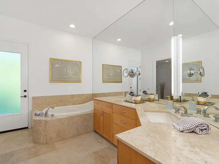 LUXURIOUS BATHROOM IN PRIMARY BEDROOM SUITE