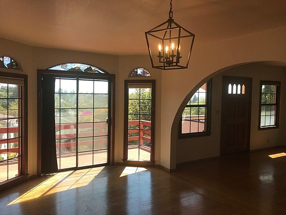 Dining room, doors to deck, stained glass