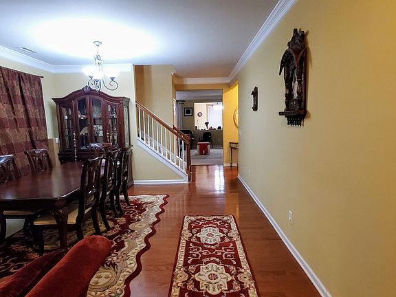 Main Entry opens to Formal Living and Dining Room