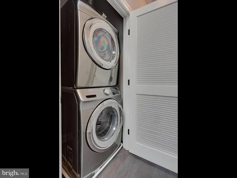 Stacked Washer/Dryer in upstairs hallway. Large Linen closet adjacent.