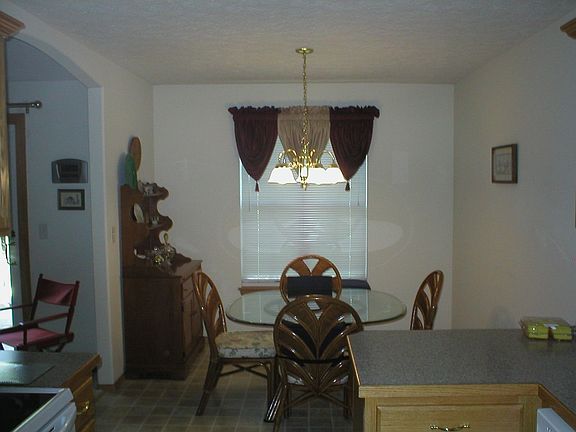 The kitchen dining area is large enough for your big table.