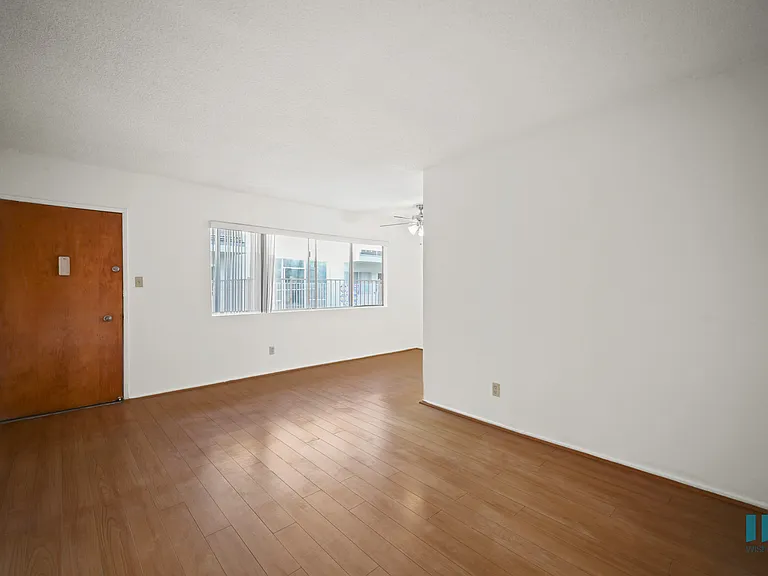 Entryway, Living, and Dining Room with Windows