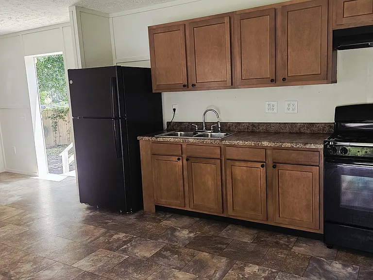 221 Whispering Pine Dr — Photo 2