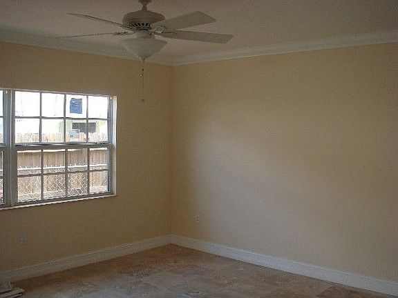 Open Living room, marble floors, crown molding
