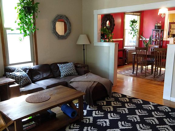 Living room, keyhole arch to dining room.